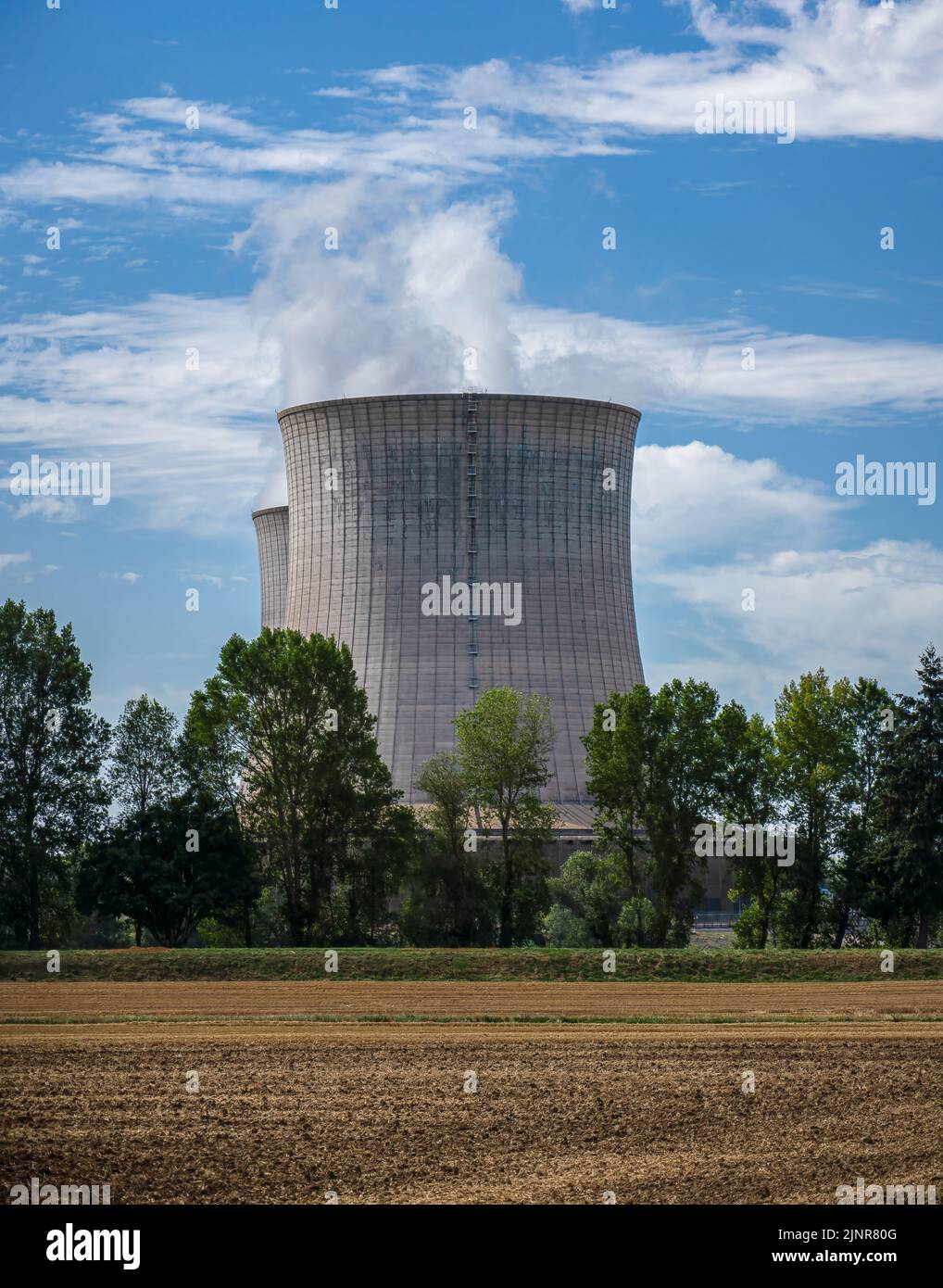 Steam Rising From Cooling Towers For A Nuclear Power Plant In The ...