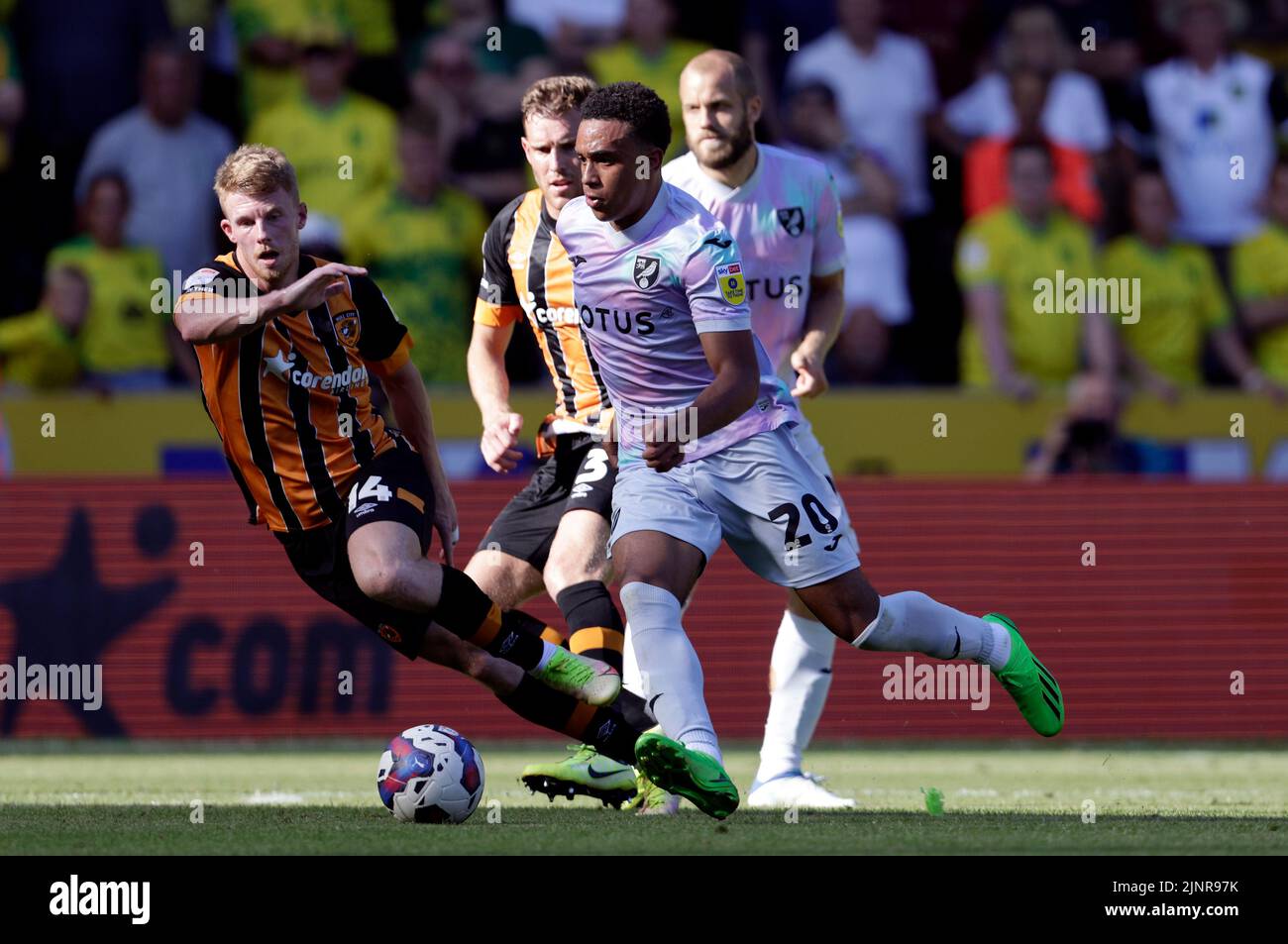 Norwich City's Aaron Ramsey runs with the ball during the Sky Bet Championship match at the MKM Stadium, Hull. Picture date: Saturday August 13, 2022. Stock Photo