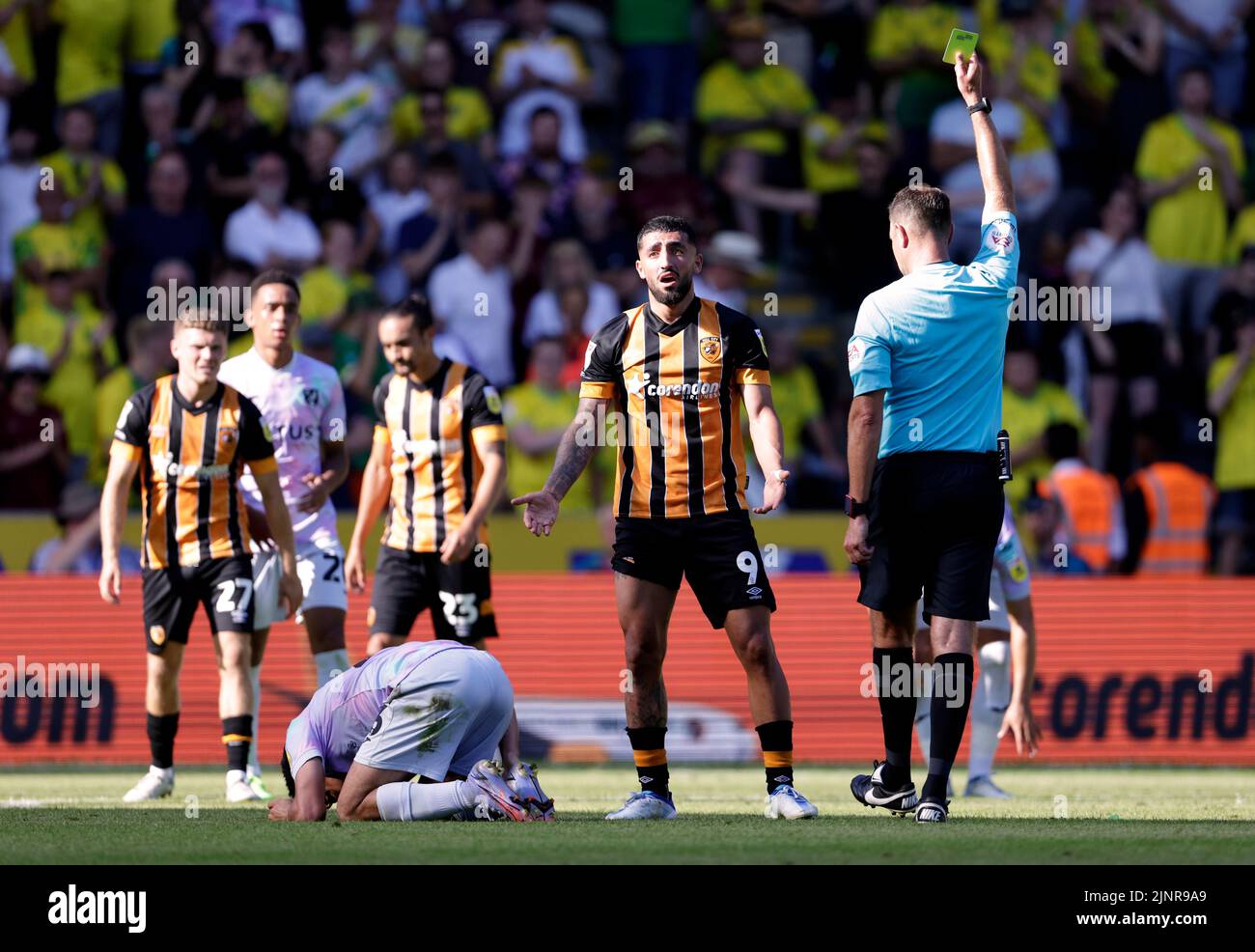 Hull City's Allahyar Sayyadmanesh reacts to being shown a yellow card during the Sky Bet Championship match at the MKM Stadium, Hull. Picture date: Saturday August 13, 2022. Stock Photo