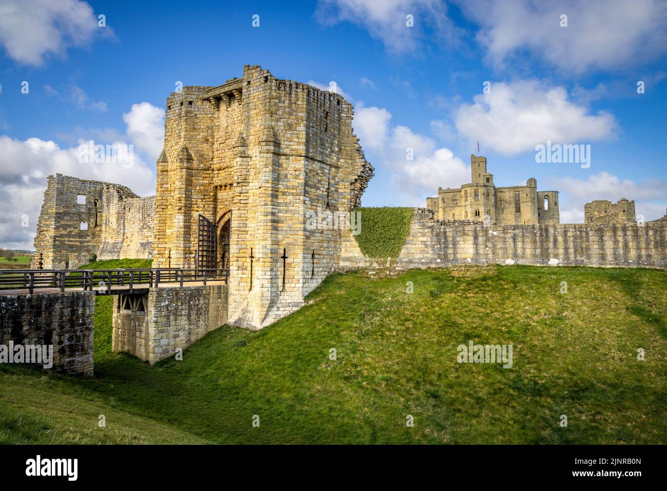 The bridge and entrance gate to Warkworth Castle, Northumberland, England Stock Photo