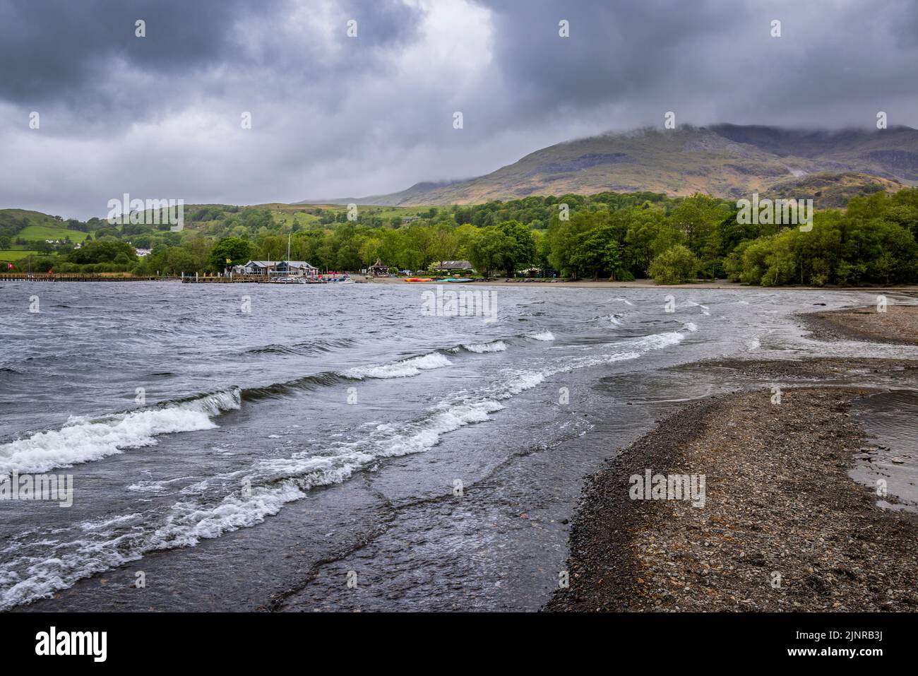 The north shore of Coniston lake on a summer's afternoon, Cumbria, England Stock Photo