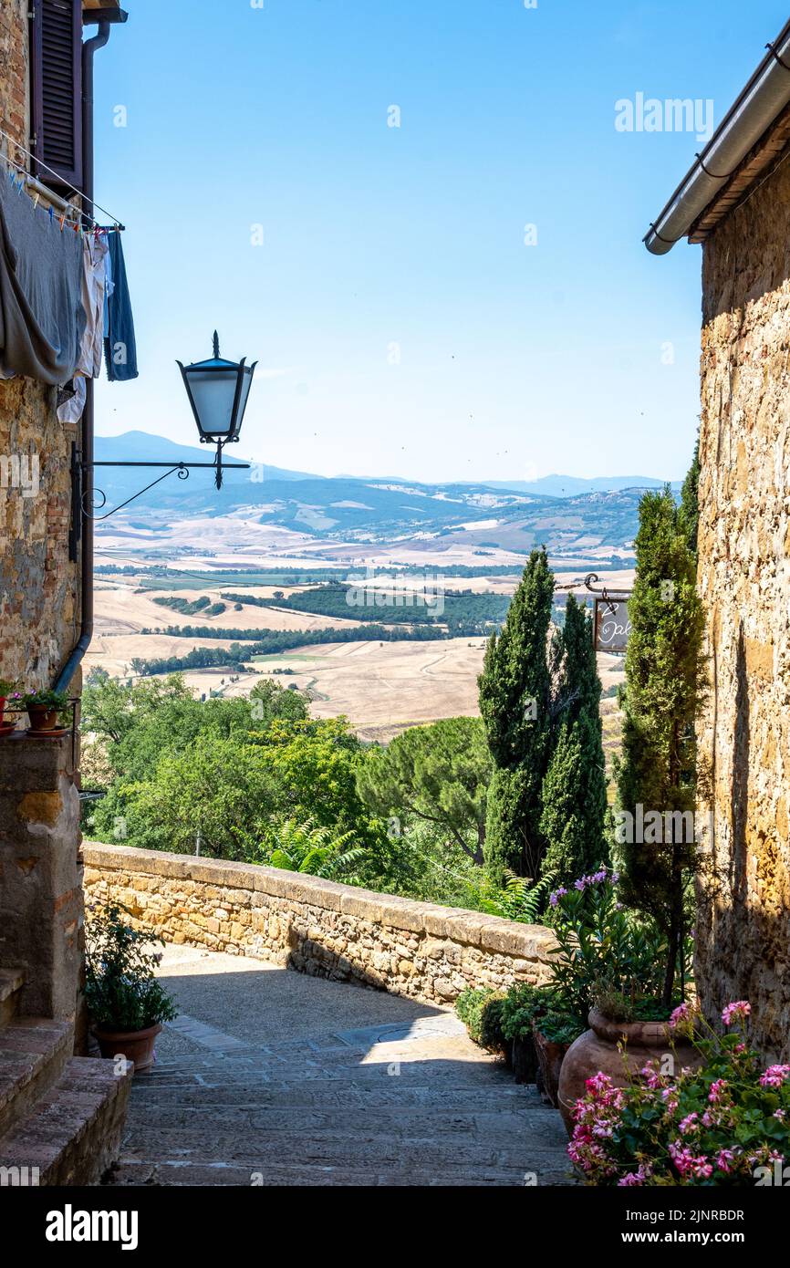 A View Across The Val D orcia Across The Walls Of Pienza Tuscany Stock a-view-across-the-val-d-orcia-across-the-walls-of-pienza-tuscany-stock