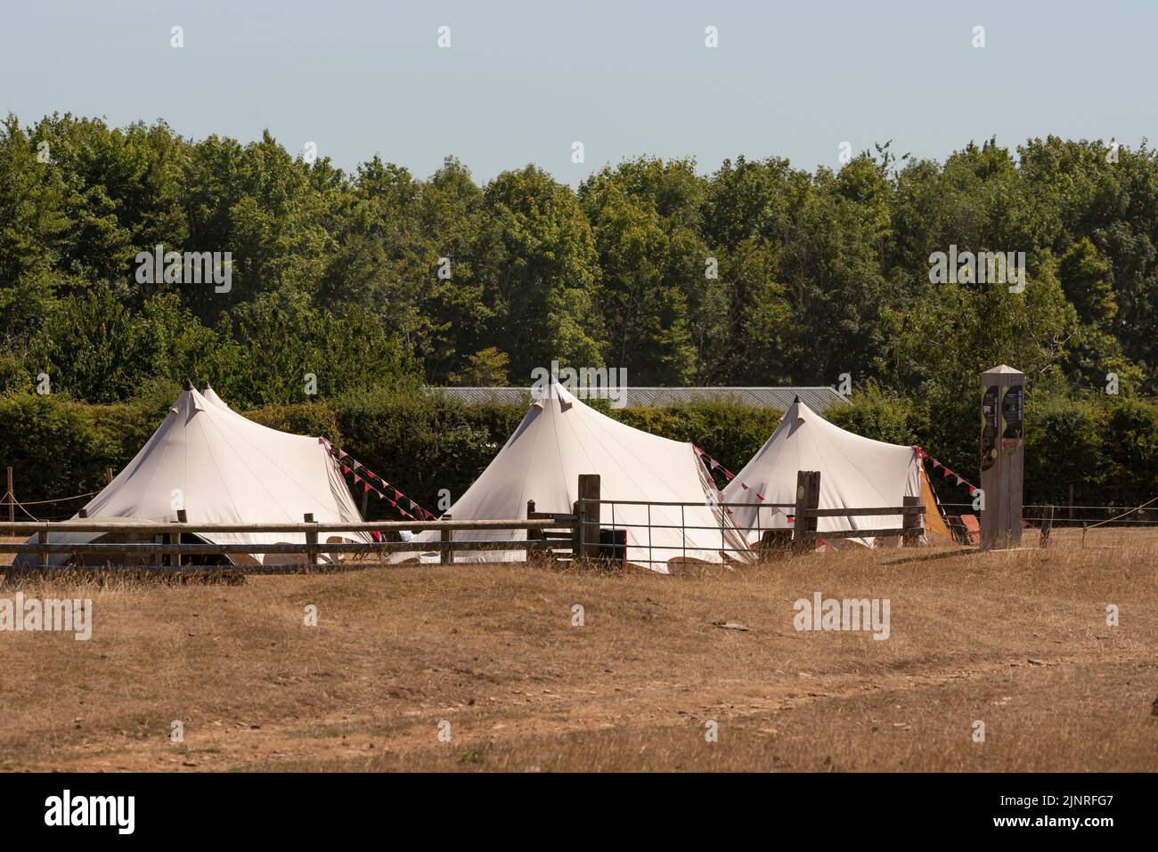 The Cotswolds, Gloucestershire, England, UK. 2022. Bell tents for a