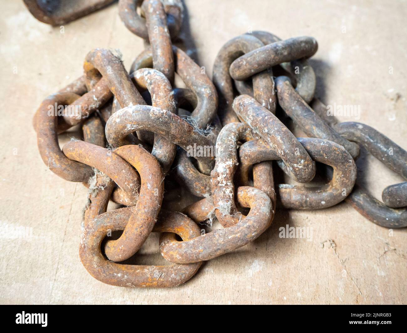 old rusted steel chains. Concept of antiquity and false security Stock Photo