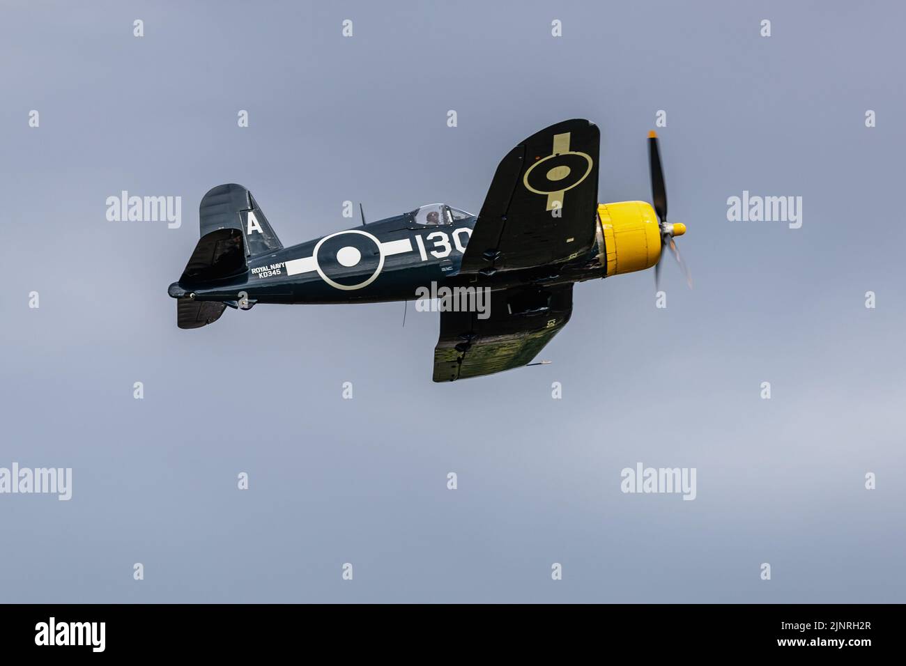 Goodyear FG-1D Corsair ‘G-FGID’ from The Fighter Collection airborne at Fly Navy Airshow held at Old Warden Aerodrome on the 3rd July 2022 Stock Photo