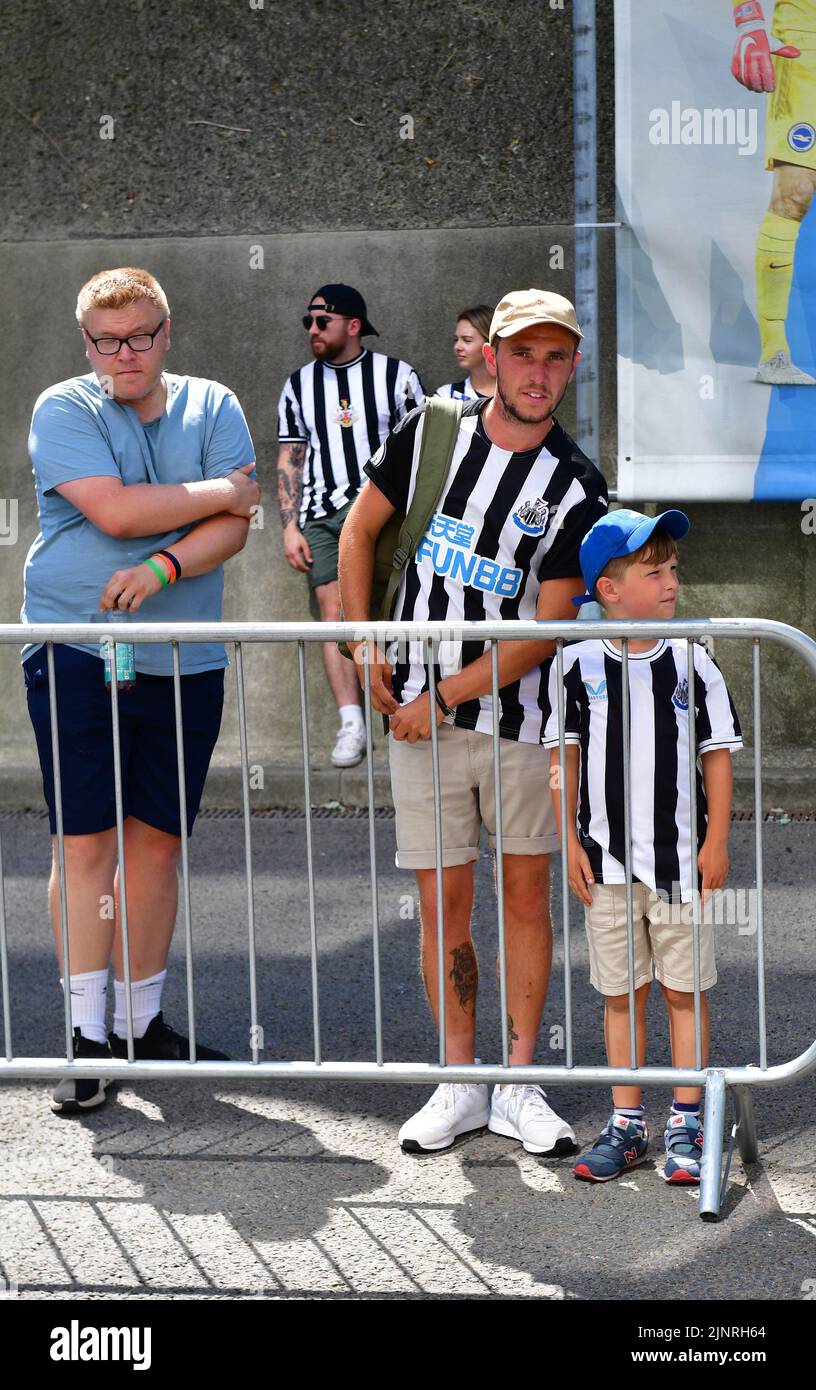 Brighton, UK. 13th Aug, 2022. Newcastle fans wait the arrival of their team coach before the Premier League match between Brighton & Hove Albion and Newcastle United at The Amex on August 13th 2022 in Brighton, England. (Photo by Jeff Mood/phcimages.com) Credit: PHC Images/Alamy Live News Stock Photo