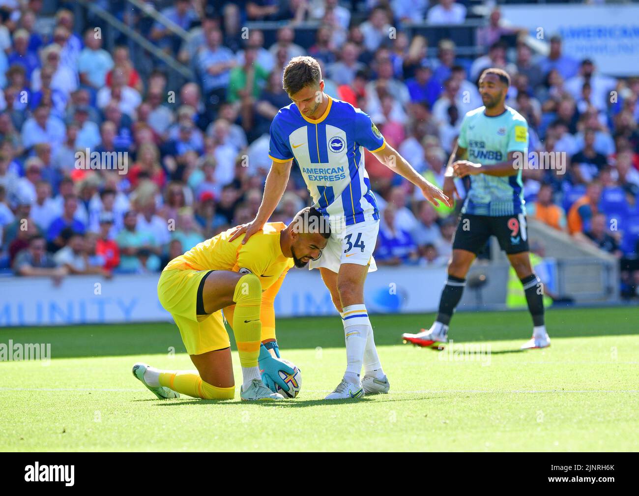 Brighton, UK. 13th Aug, 2022. Robert Sanchez Goalkeeper of Brighton and Hove Albion and Joel Veltman of Brighton and Hove Albion smother the ball during the Premier League match between Brighton & Hove Albion and Newcastle United at The Amex on August 13th 2022 in Brighton, England. (Photo by Jeff Mood/phcimages.com) Credit: PHC Images/Alamy Live News Stock Photo