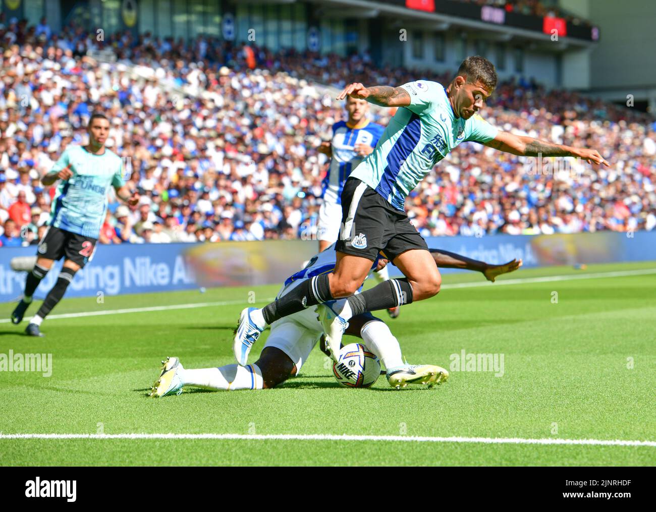 Brighton, UK. 13th Aug, 2022. Moises Caicedo of Brighton and Hove Albion fouls Bruno Guimaraes of Newcastle United during the Premier League match between Brighton & Hove Albion and Newcastle United at The Amex on August 13th 2022 in Brighton, England. (Photo by Jeff Mood/phcimages.com) Credit: PHC Images/Alamy Live News Stock Photo
