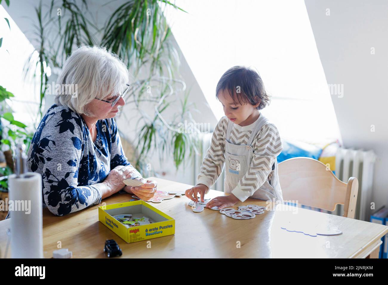 Bonn, Deutschland. 01st June, 2022. Voluntary work: grandmother on time. || Model release available Credit: dpa/Alamy Live News Stock Photo