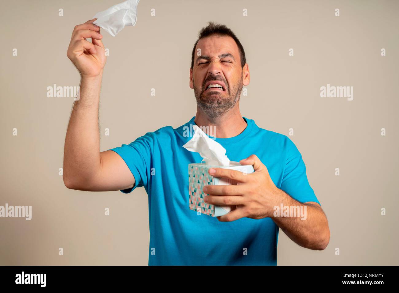 Sick and unhealthy allergic crying man has watery swelling, red eyes