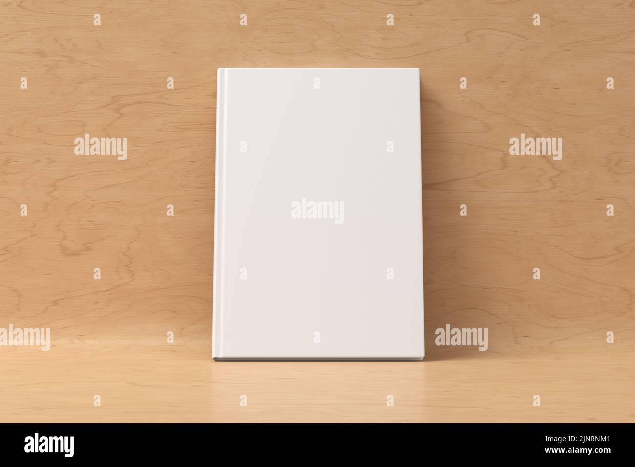 Blank vertical hardcover book cover mockup standing on wooden background. 3d render Stock Photo