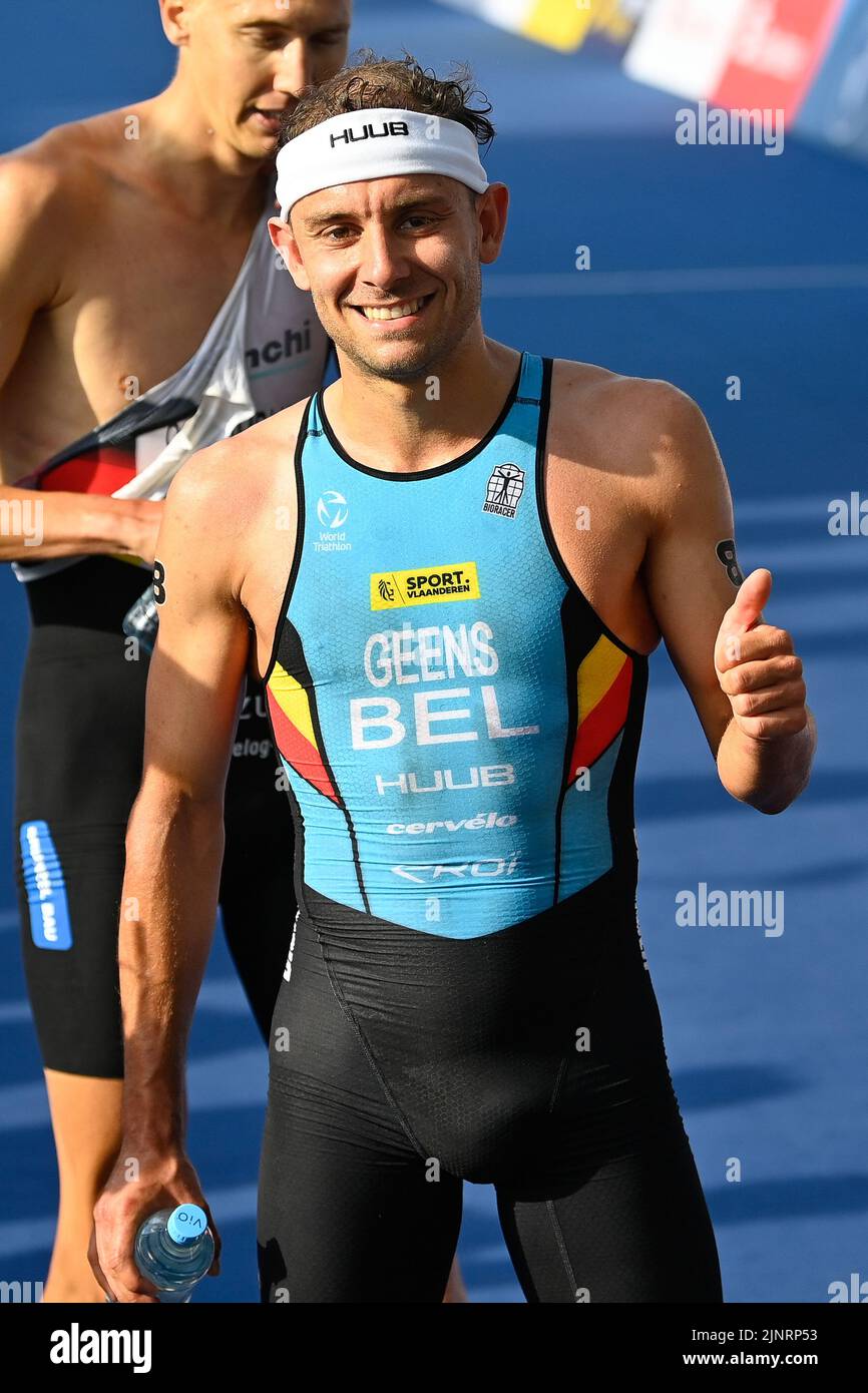 Belgian triathlete Jelle Geens crosses the finish line of the men Triathlon European