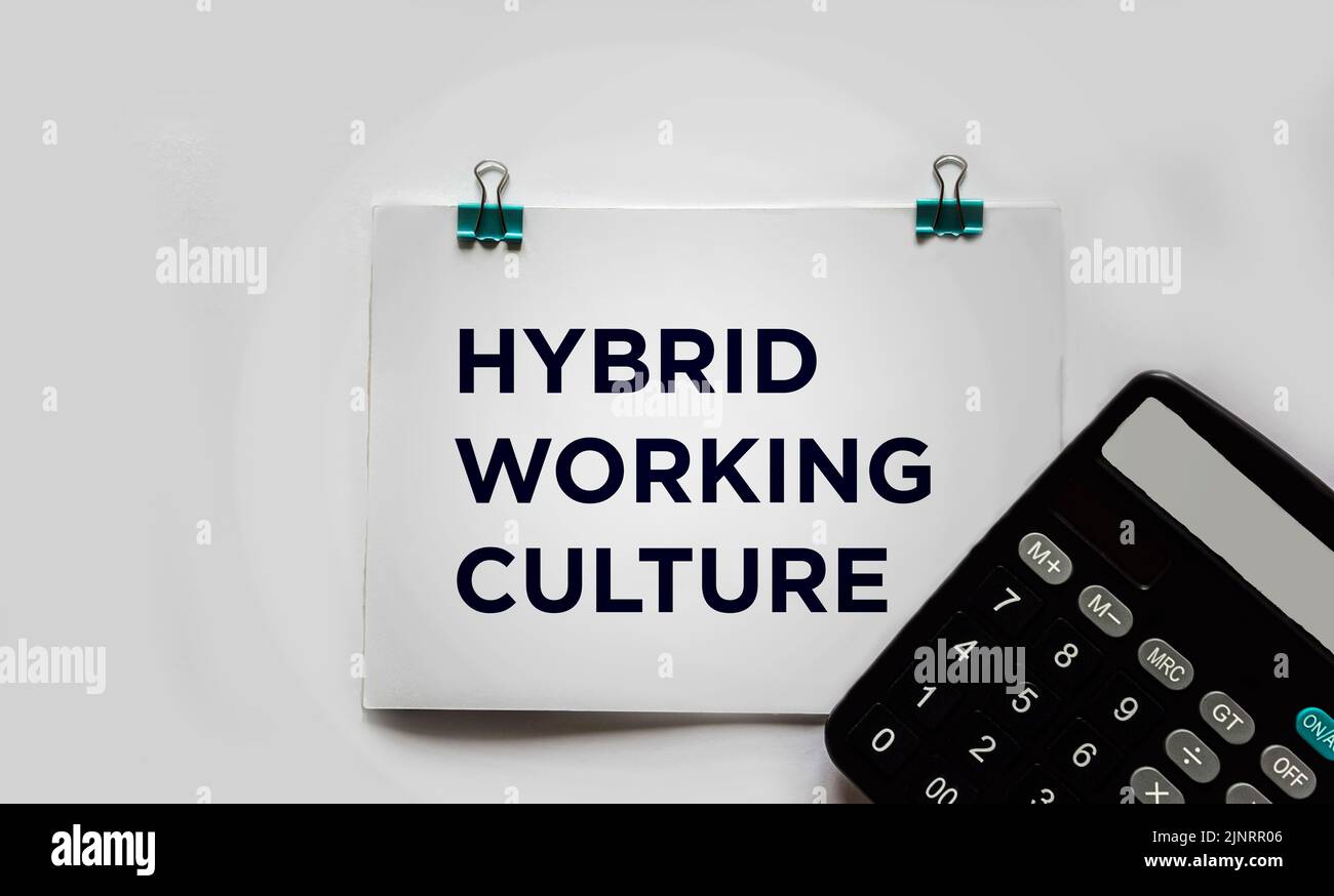 Hybrid work culture shown with text on white background Stock Photo