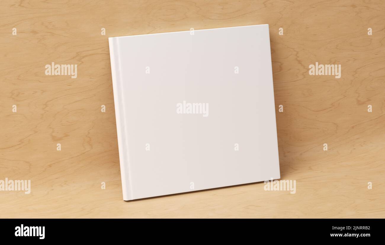 Blank square hardcover book cover mockup standing on wooden background. 3d render Stock Photo