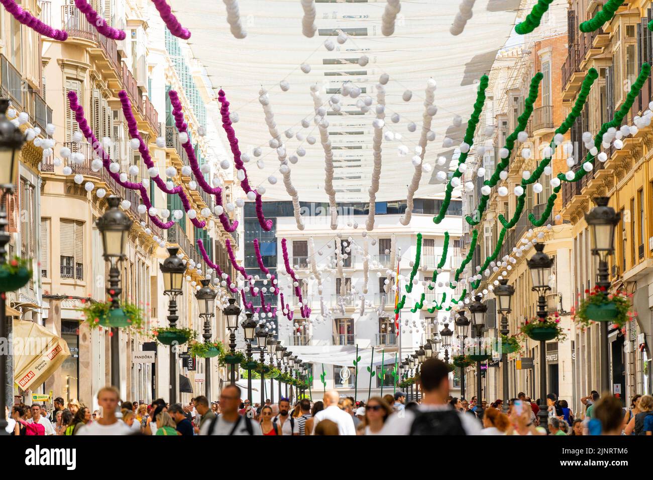 Panoramic view of the Malaga's Fair 2022 decoration installed at Marques de Larios Street. The Fair is being held for the first time since 2019. The 2020 and 2021 editions were suspended due to Covid19 pandemic. Stock Photo