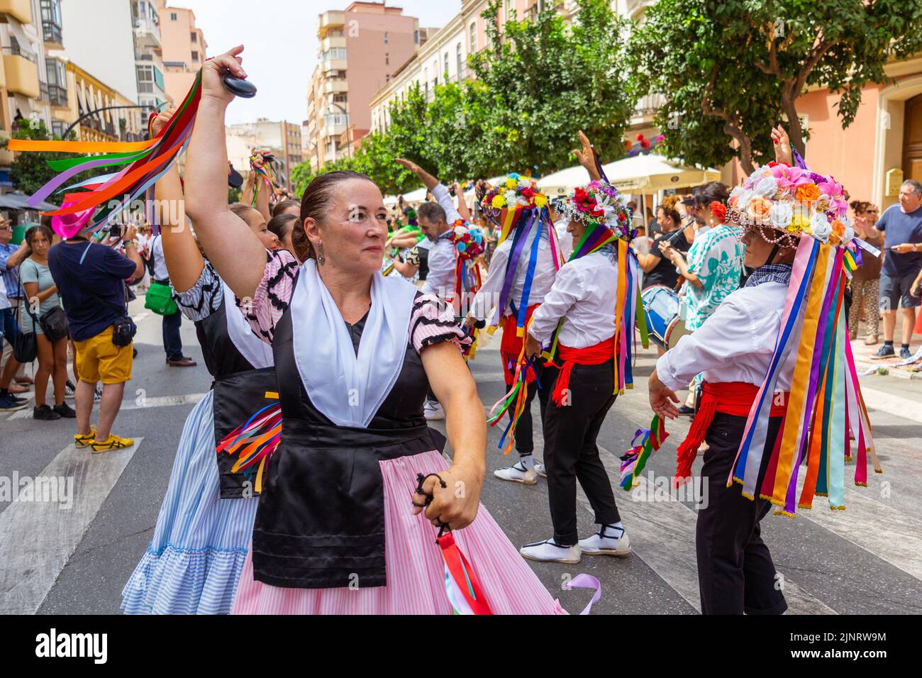 Two women seen dancing 'verdiales' during the first day of Malaga's Fair 2022. The Fair is being held for the first time since 2019. The 2020 and 2021 editions were suspended due to Covid19 pandemic. (Photo by Francis Gonzalez / SOPA Images/Sipa USA) Stock Photo