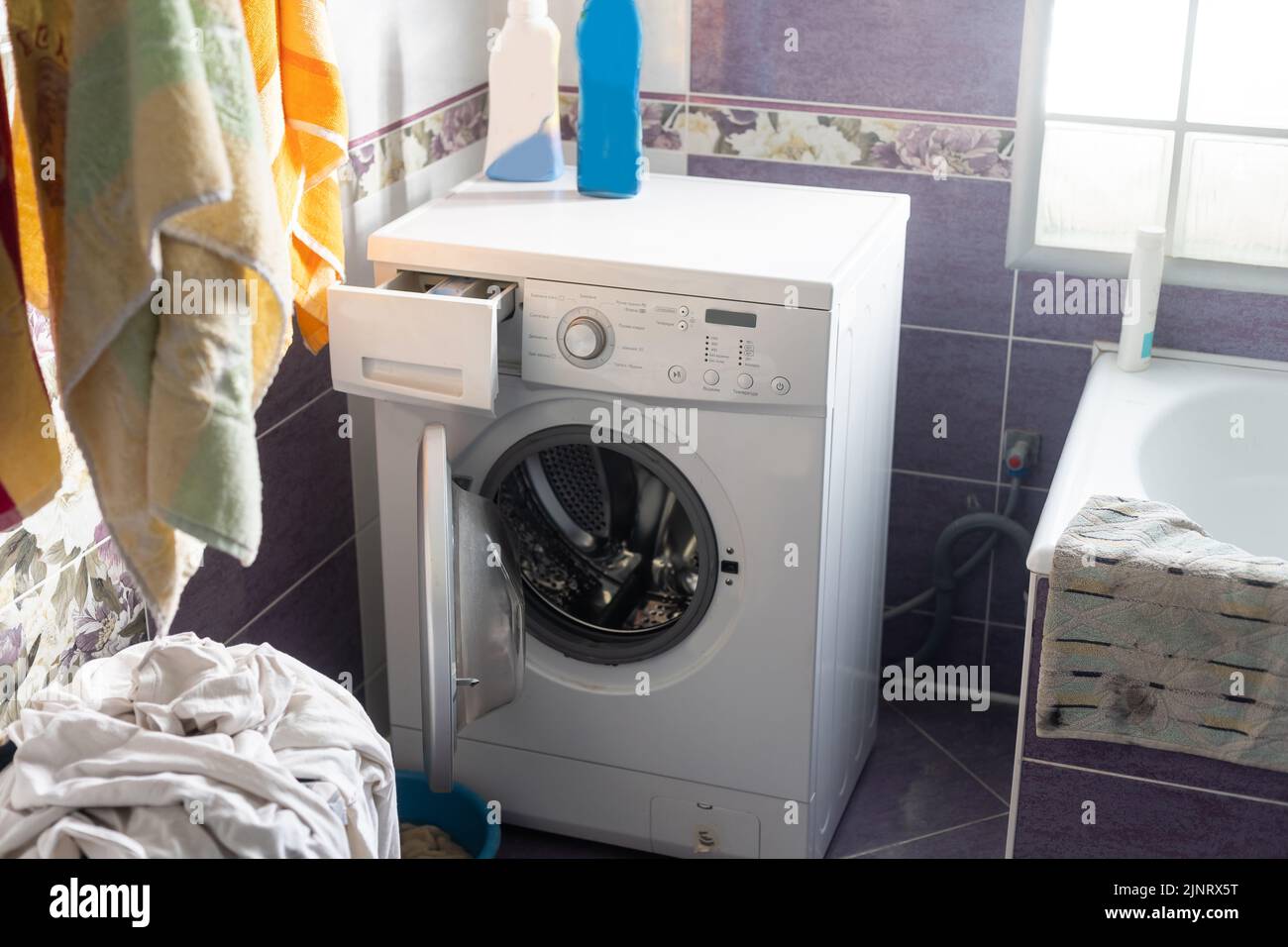 washing machine broken in the bathroom Stock Photo Alamy