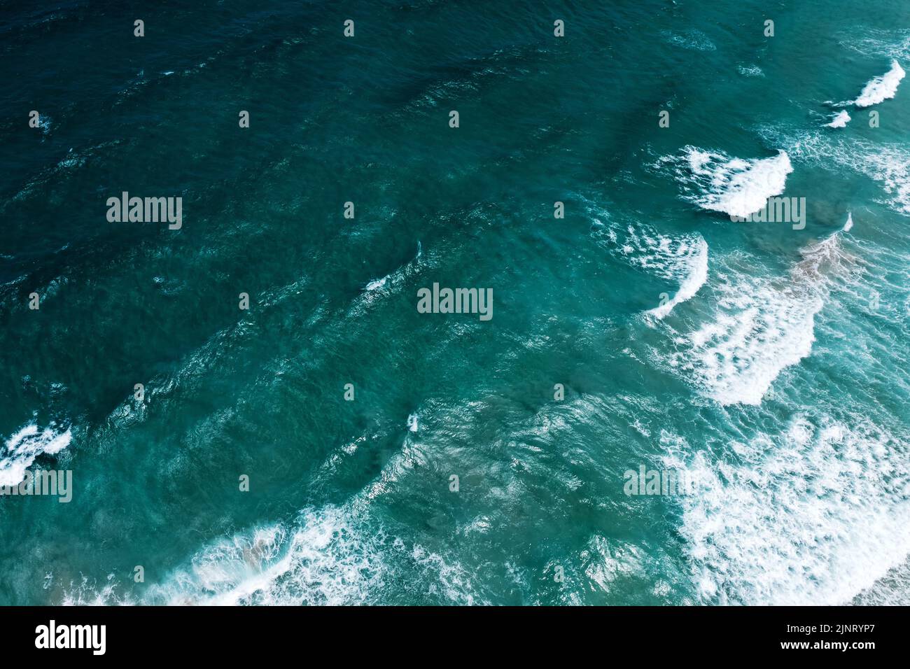 Tropical ocean with waves abstract at Tip of Borneo Kudat Sabah Borneo Stock Photo