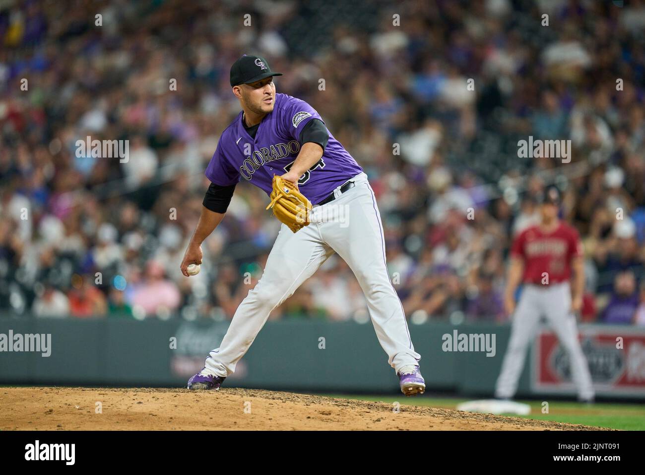 August 12 2022: Colorado pitcher Carlos Estevez (54) throws a pitch ...