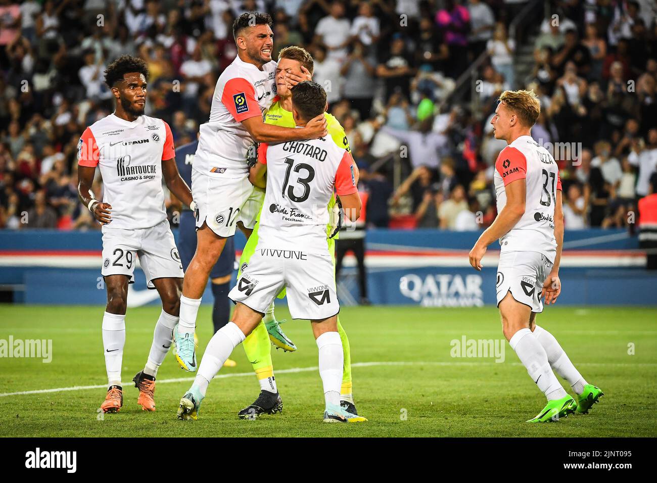 Jonas OMLIN of Montpellier celebrate with teammates the stop of the penalty of Kylian MBAPPE of PSG during the French championship Ligue 1 football match between Paris Saint-Germain and Montpellier HSC on August 13, 2022 at Parc des Princes stadium in Paris, France - Photo Matthieu Mirville / DPPI Stock Photo