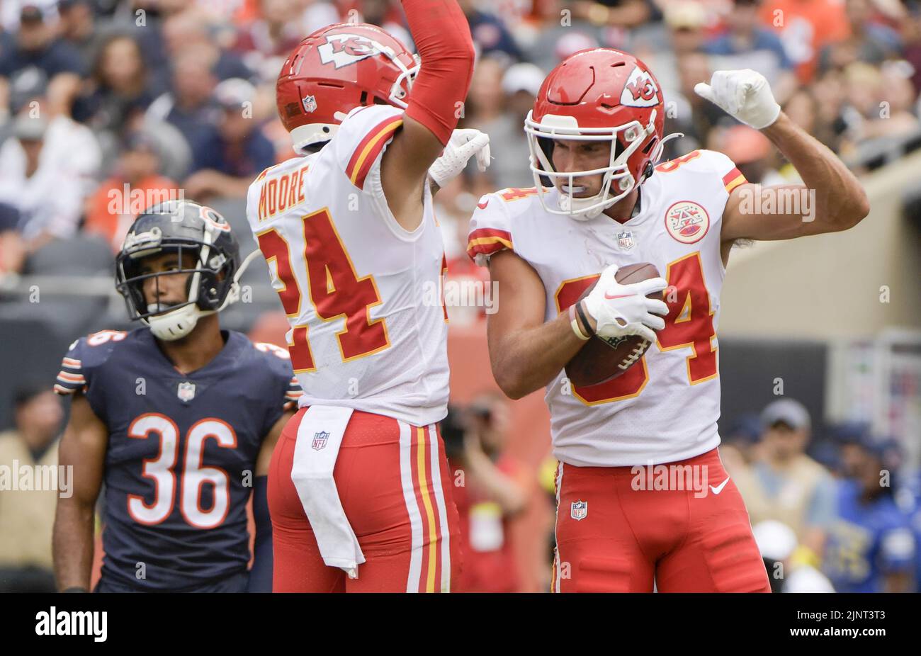 Chicago, United States. 13th Aug, 2022. Kansas City Chiefs wide receiver Skyy Moore (24) celebrates with Justin Watson (84) after a second quarter touchdown against the Chicago Bears during a preseason game at Soldier Field in Chicago on Saturday, August 13, 2022. Photo by Mark Black/UPI Credit: UPI/Alamy Live News Stock Photo