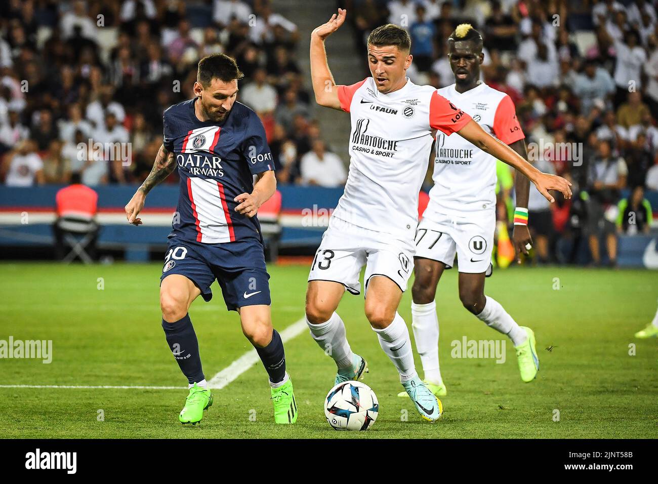 Lionel (Leo) MESSI of PSG and Joris CHOTARD of Montpellier during the French championship Ligue 1 football match between Paris Saint-Germain and Montpellier HSC on August 13, 2022 at Parc des Princes stadium in Paris, France - Photo Matthieu Mirville / DPPI Stock Photo