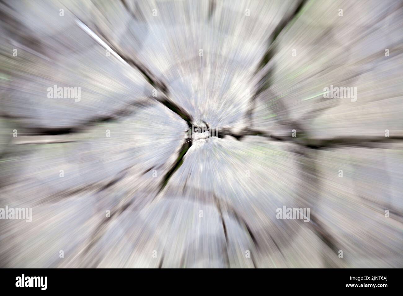 A ICM photo looking down at the cracks in the mud at the Snake Pass end of the Ladybower reservoir, Peak district, UK Stock Photo