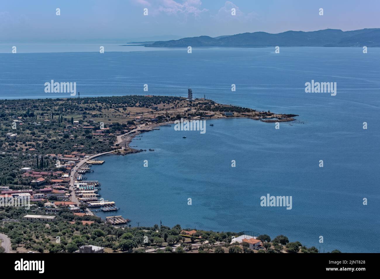 Panoramic view of Sivrice Bay in Aegean Sea coast of Turkey. Midilli Island in the background. Stock Photo