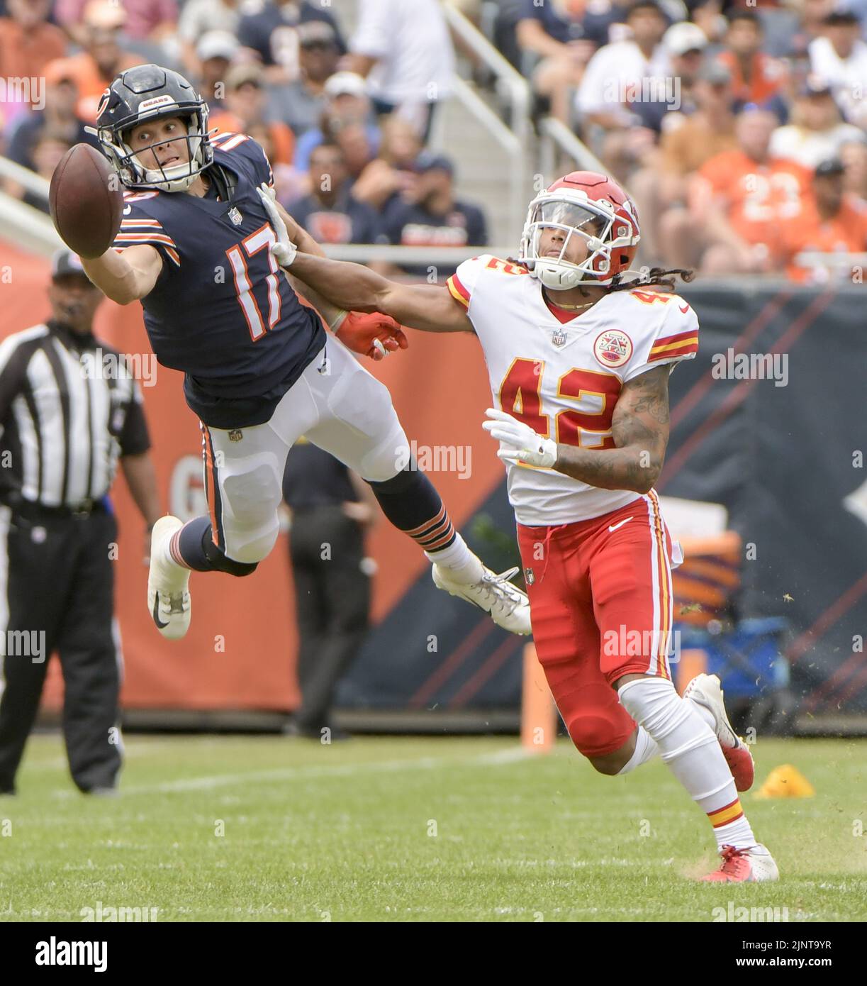 Chicago, United States. 13th Aug, 2022. Chicago Bears wide receiver Chris Finke (17) attempts to catch a pass from quarterback Nathan Peterman as Kansas City Chiefs safety Devon Key (42) looks on during the fourth quarter of a preseason game at Soldier Field in Chicago on Saturday, August 13, 2022. The Bears won 19-14. Photo by Mark Black/UPI Credit: UPI/Alamy Live News Stock Photo