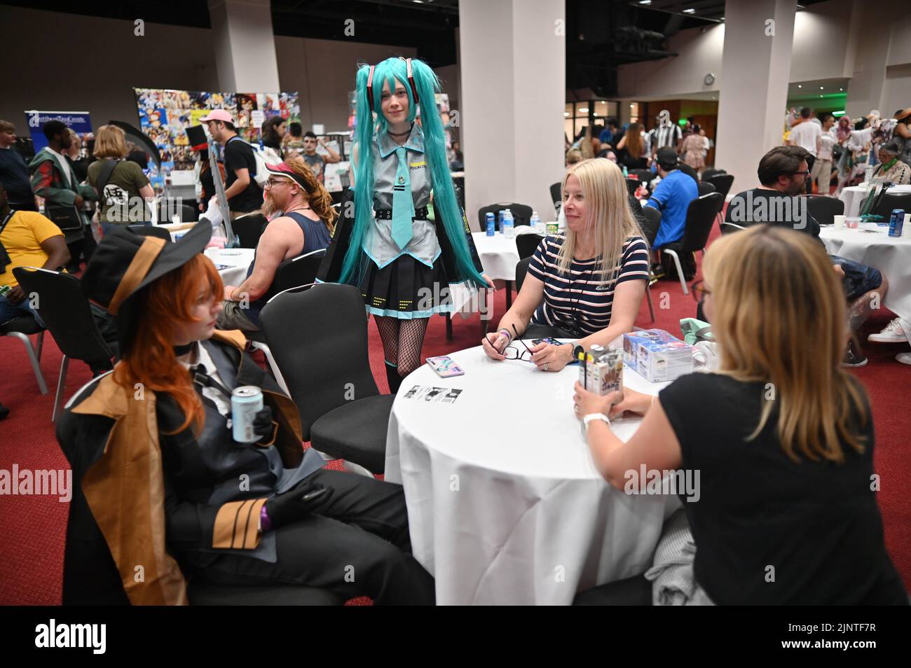 Hundreds of stands and live performances, participants dressed as Anime