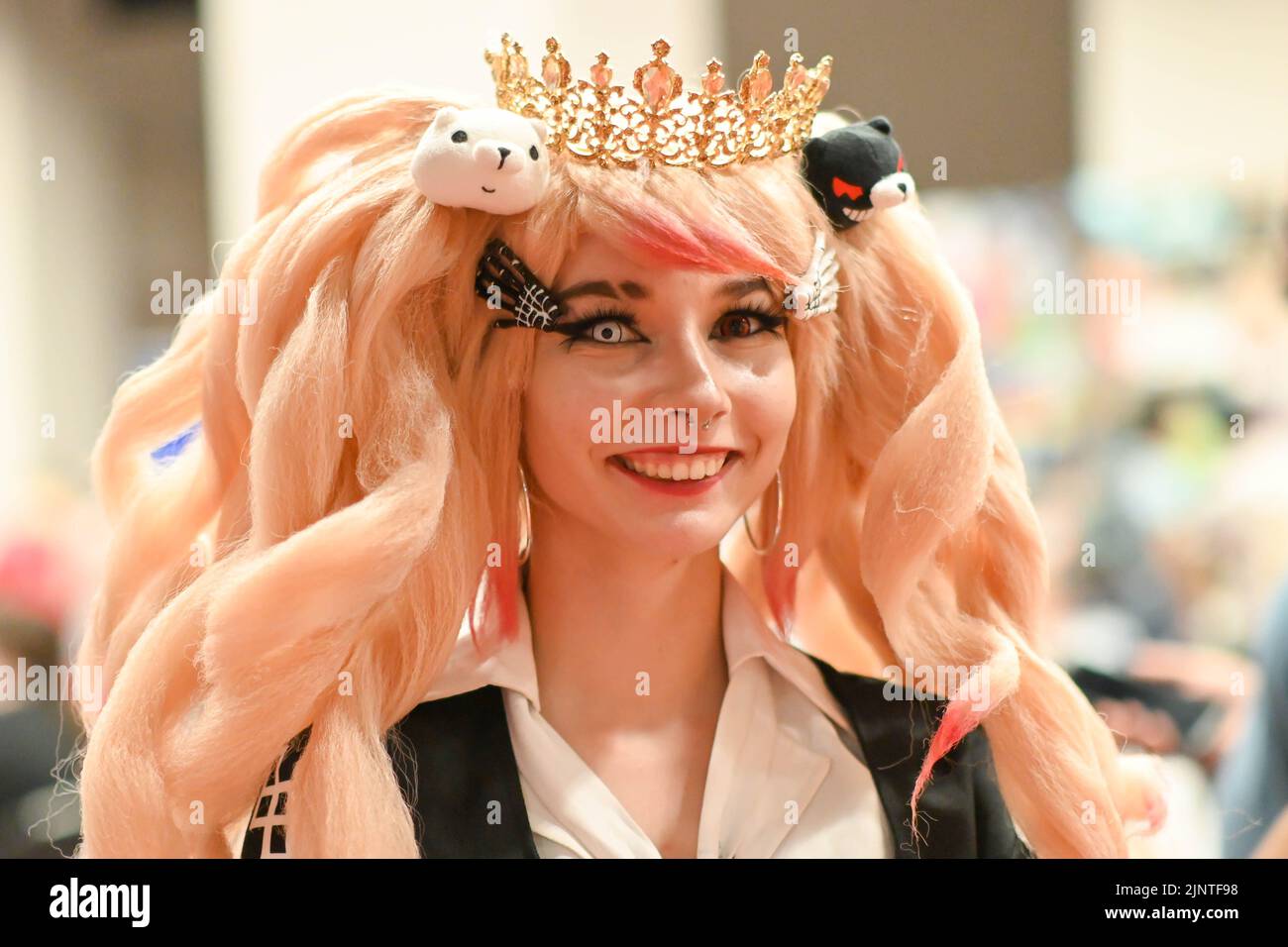 Hundreds of stands and live performances, participants dressed as Anime