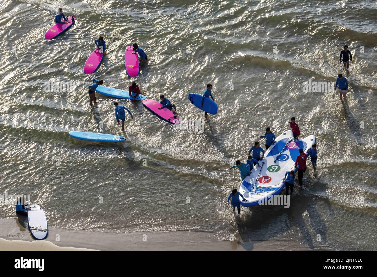 Tel Aviv, Israel. 10th Aug, 2022. Surfers seen in Tel Aviv. Tel Aviv, located along the Mediterranean coastline, is Israel's cultural hub and a major travel destination that attracts tourists from around the world. (Credit Image: © Ronen Tivony/SOPA Images via ZUMA Press Wire) Stock Photo