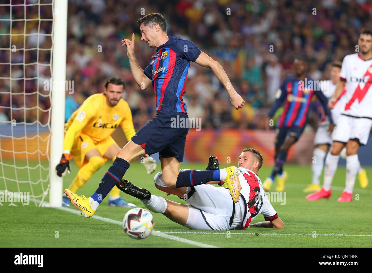 Florian Lejeune of Rayo Vallecano in action with Robert Lewandowski of FC Barcelona during the Liga match between FC Barcelona and Rayo Vallecano at Spotify Camp Nou in Barcelona, Spain. Stock Photo