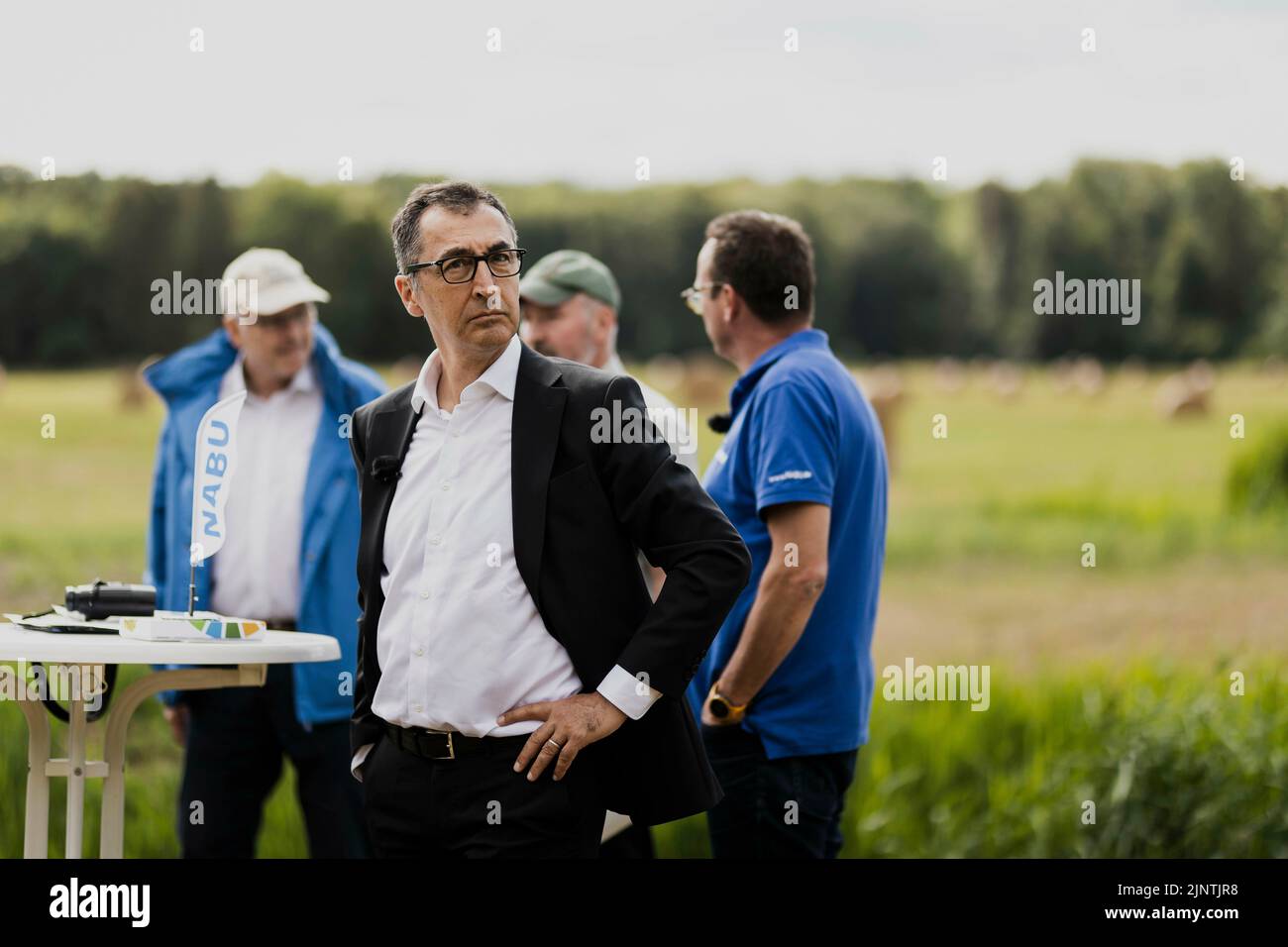 Templin, Deutschland. 27th July, 2022. Cem Oezdemir (Alliance 90/The Greens), Federal Minister of Agriculture and Food, photographed during a visit to a wet meadow near Templin, July 27, 2022. Credit: dpa/Alamy Live News Stock Photo