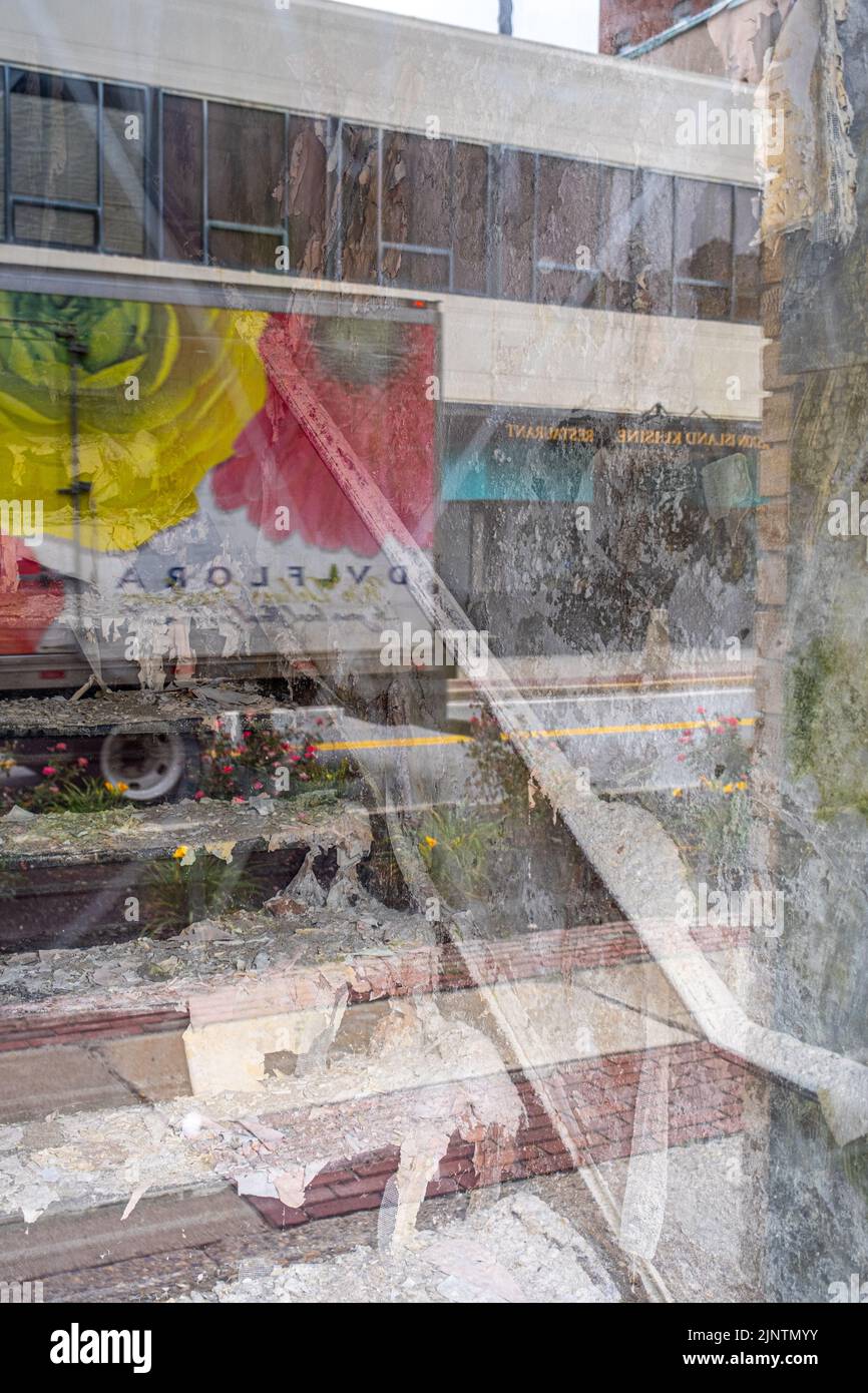 A reflection of a truck in a door window Stock Photo