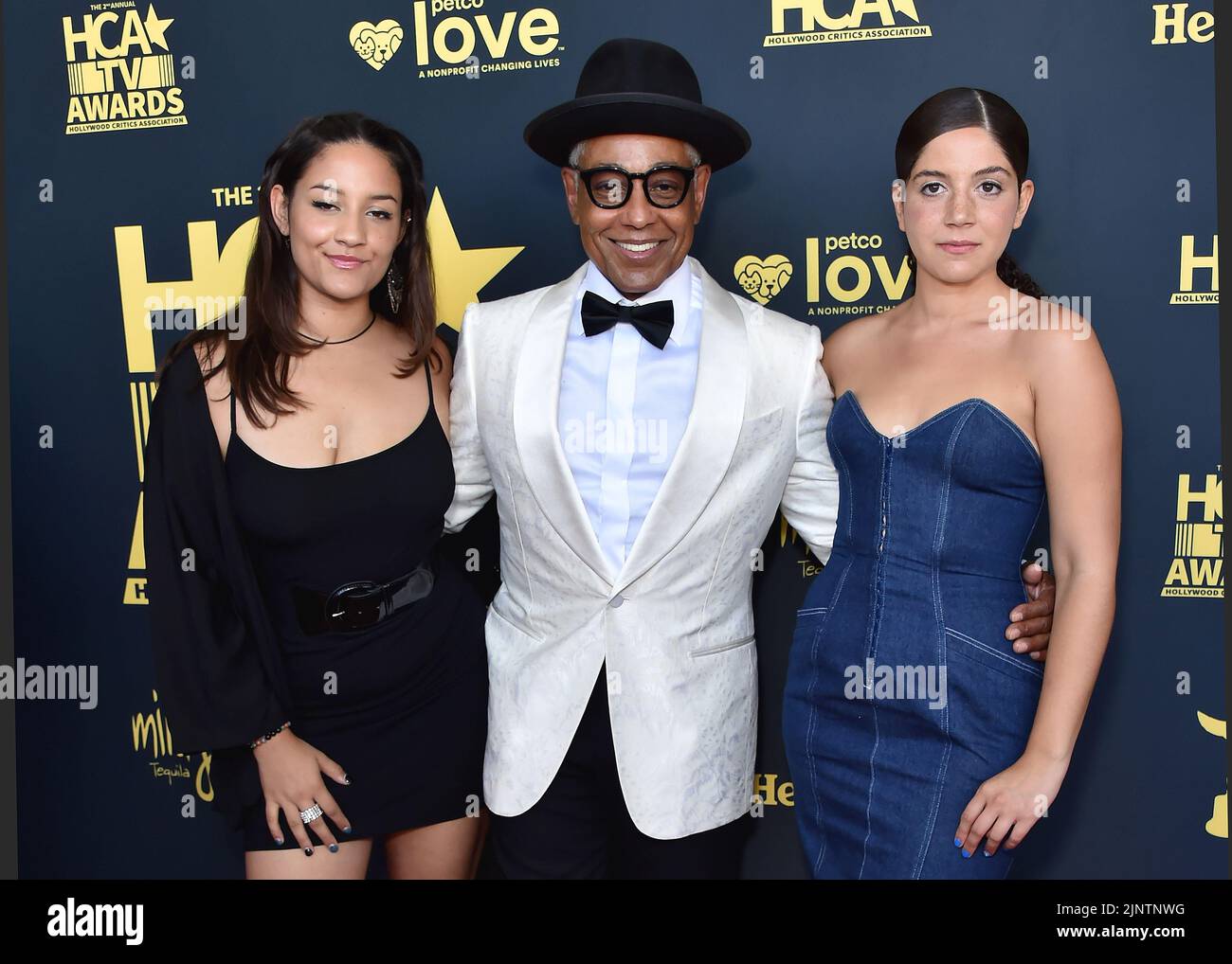 Giancarlo Esposito and daughters walking on the red carpet at the The