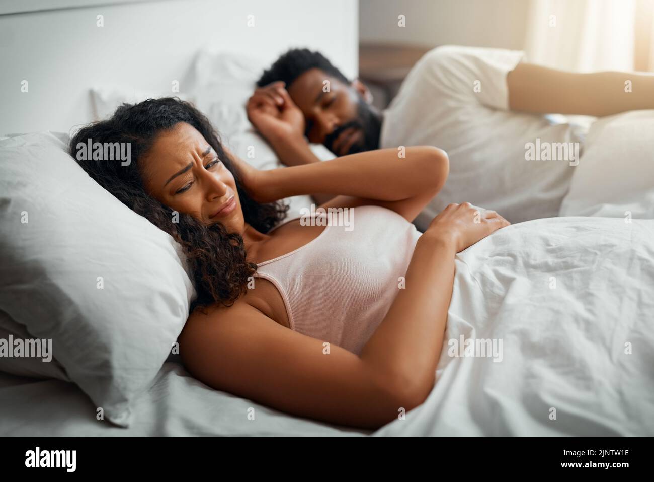 Struggling to sleep with this snoring going on. a beautiful wife