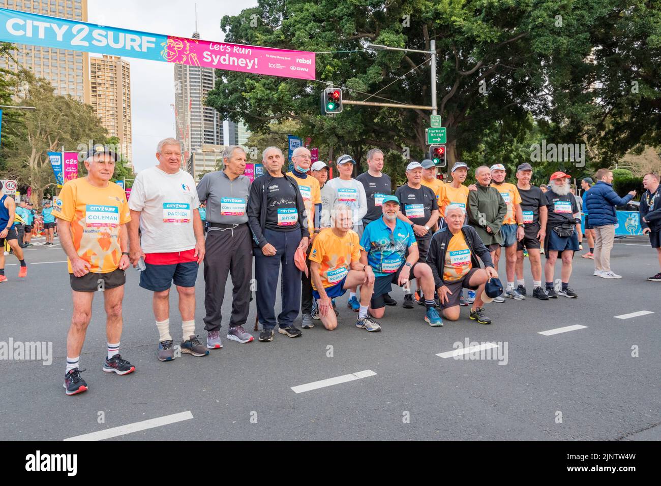 Sydney, Australia.14 August 2022: Some 60,000+ people are taking part in the 50th City2Surf race in Sydney, the first since 2019 after cancellations in 2020 and 2021 due to Covid-19 restrictions. The fourteen-kilometre race, the largest of its kind in the world, leads runners from Hyde Park out of the city, up and over heart break hill and on to Bondi Beach. Pictured: “The Legends” runners who have taken part in every event since the start in 1971 Credit: Stephen Dwyer / Alamy Live News Stock Photo