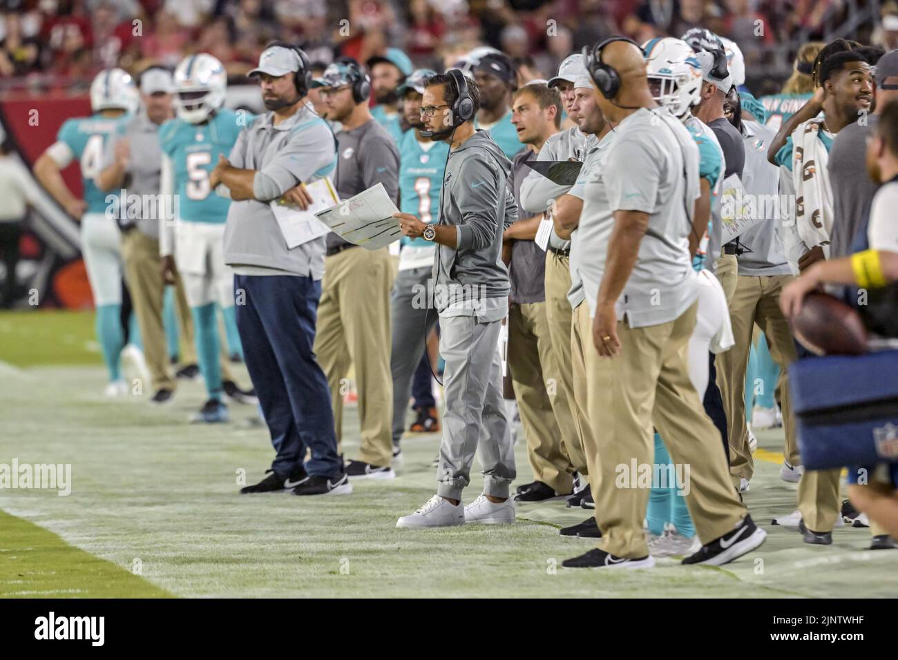 Tampa, United States. 13th Aug, 2022. Miami Dolphins head coach Mike McDaniel (C) watches from the sidelines during the first half of their preseason game against the Tampa Bay Buccaneers at Raymond James Stadium in Tampa, Florida on Saturday, August 13, 2022. Photo by Steve Nesius/UPI Credit: UPI/Alamy Live News Stock Photo