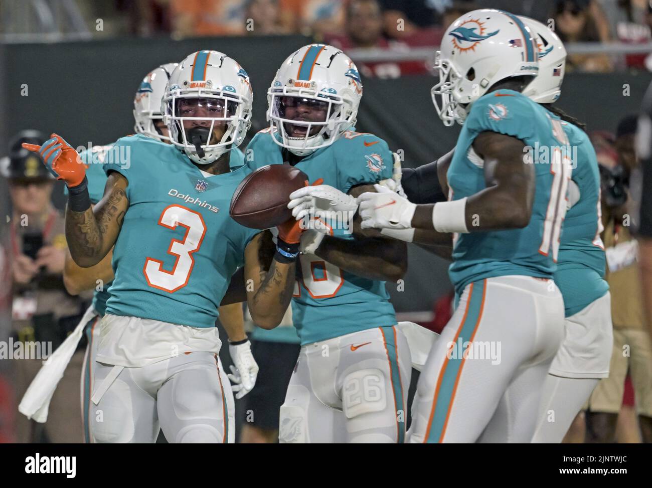 Tampa, United States. 13th Aug, 2022. Miami Dolphins wide receiver Lynn Bowden Jr. (3) celebrates with teammates after scoring a touchdown during the first half of their preseason game against the Tampa Bay Buccaneers at Raymond James Stadium in Tampa, Florida on Saturday, August 13, 2022. Photo by Steve Nesius/UPI Credit: UPI/Alamy Live News Stock Photo
