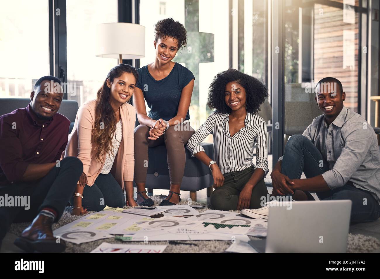 Were here for success. Portrait of a group of young entrepreneurs going ...