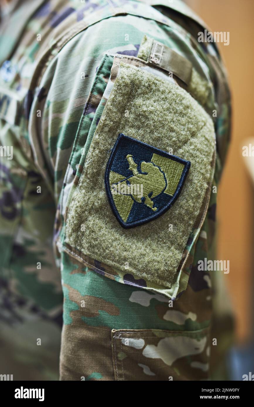 Soldiers wear their feelings on their sleeves. a soldier wearing