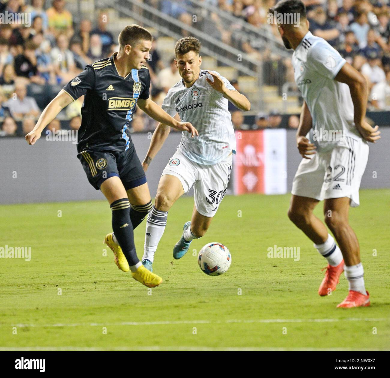 August 13, 2022: August13, 2022, Chester PA- Philadelphia Union player, DANIEL GAZDAG (6) fights for the ball against Chicago Fire players GASTON GIMENEZ (30) and MAURICIO PINEDA (22) during the match at Subaru Park in Chester PA (Credit Image: © Ricky Fitchett/ZUMA Press Wire) Stock Photo