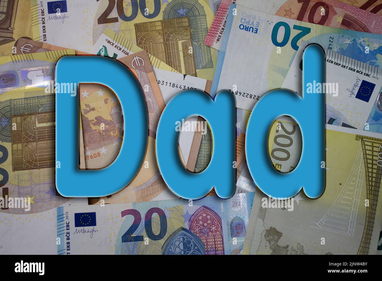 Dad word with money. Paper currency background with different banknotes. Stock Photo