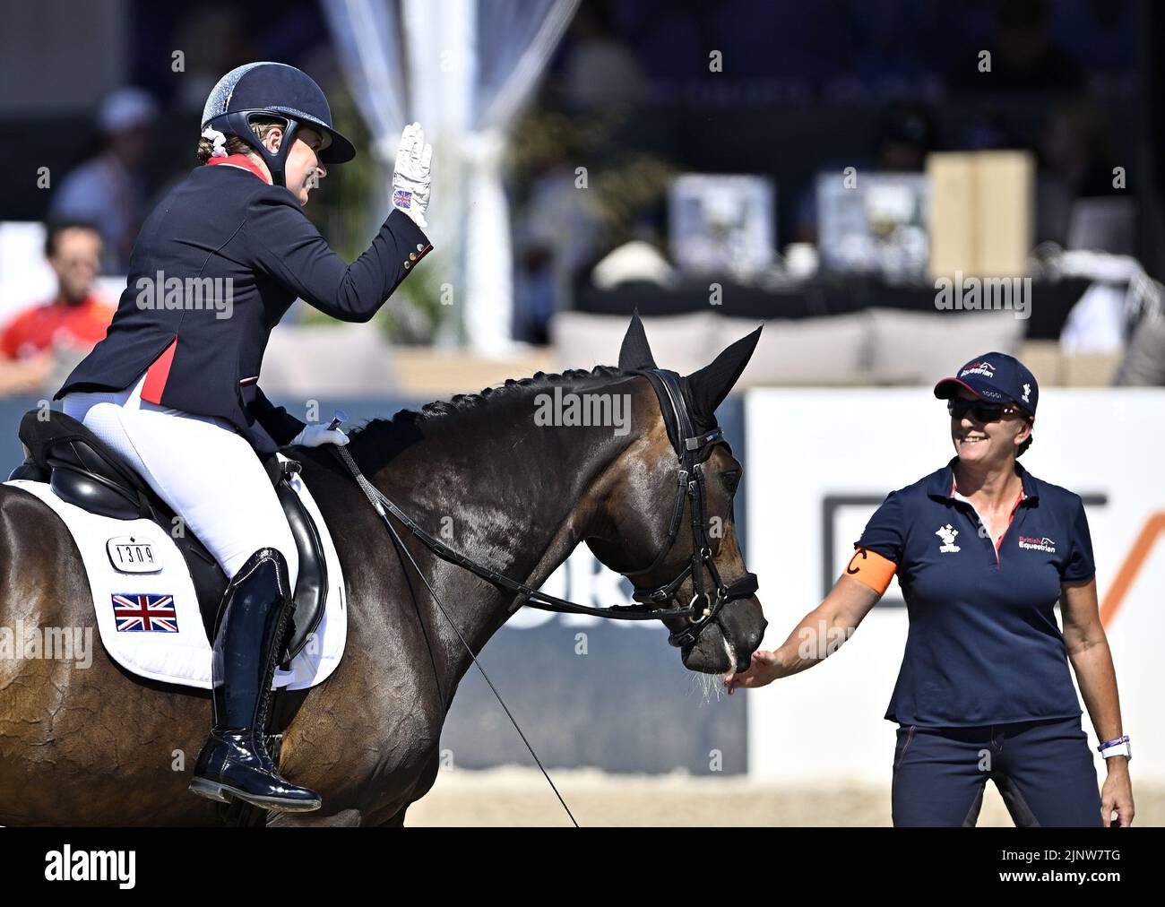 Herning. Denmark. 13 August 2022. World Equestrian Games.Natasha Baker (GBR) riding KEYSTONE DAWN CHORUS celebrates at the end of her test in the FEI Para Dressage Team championships - Grade III. Stock Photo