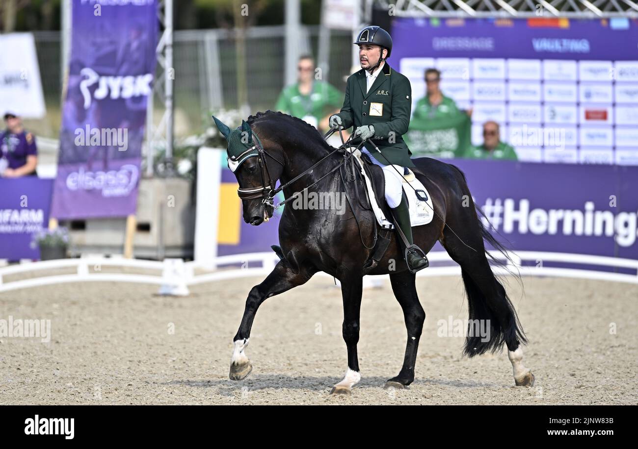 Herning, Denmark. 13th Aug, 2022. World Equestrian Games.Ahmed Sharbatly (KSA) riding WESTENWIND during the FEI Para Dressage Team championships - Grade III. Credit: Sport In Pictures/Alamy Live News Stock Photo