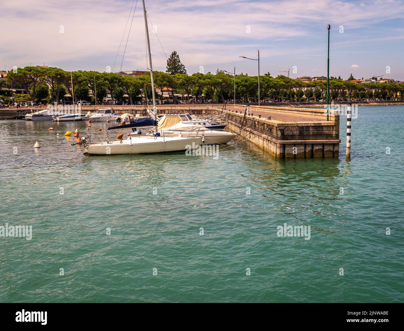 Peschiera del Garda town. Little town Harbour with colorful boats. Italian Garda lake, Veneto region of northern Italy - Charming fortified citadel Stock Photo