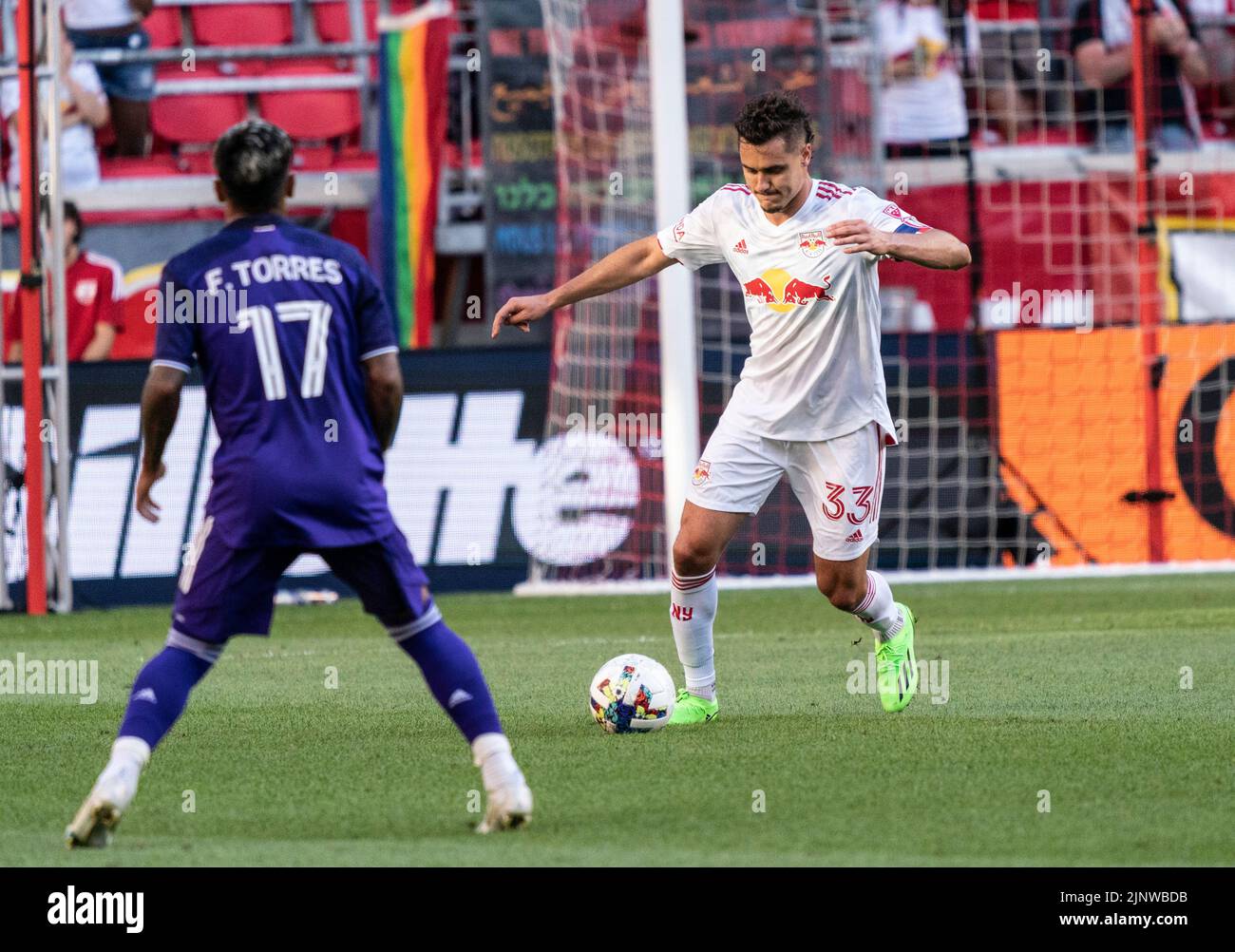 Harrison, NJ - August 13, 2022: Aaron Long (33) of Red Bulls controls ball during MLS regular season game against Orlando City FC at Red Bull Arena Stock Photo