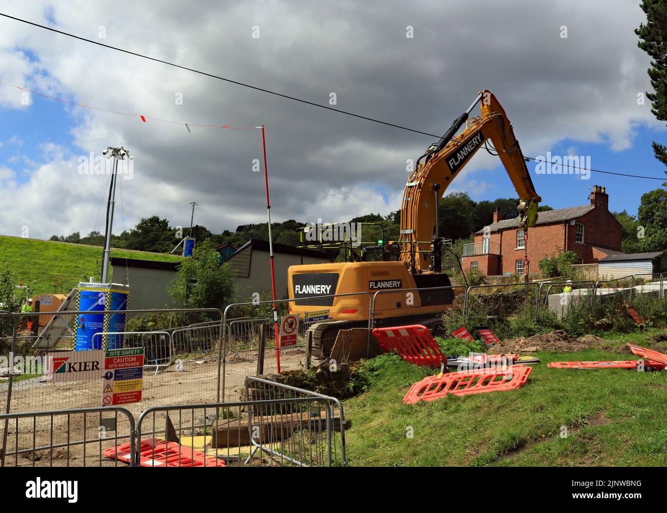 Plant and machinery are setting up the contractor’s compound at Toddbrook reservoir ready to start repairs following damage to the dam spillway. Stock Photo
