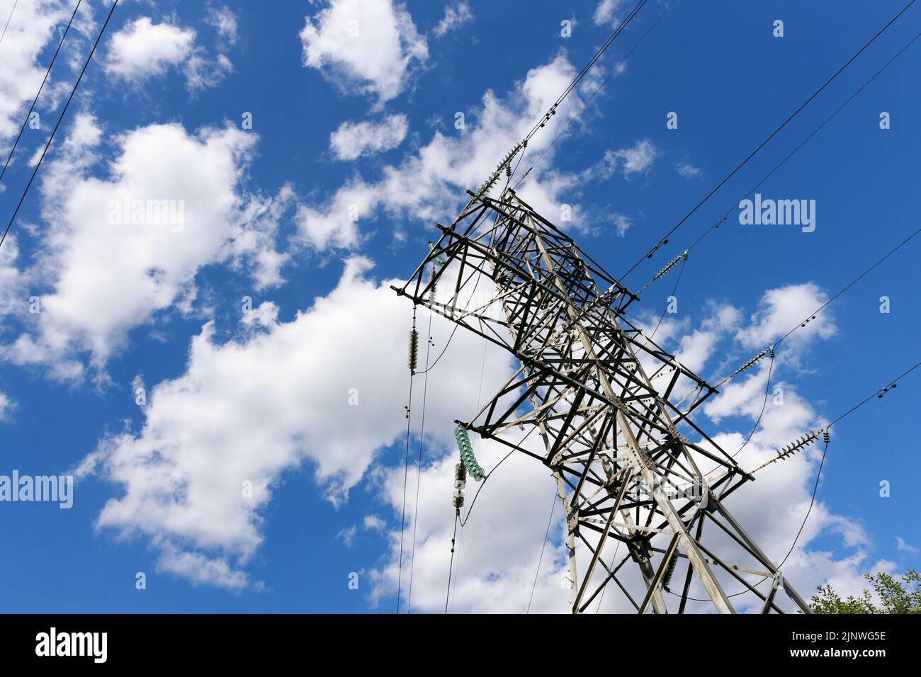 Power line against blue sky and sun power lines hi-res stock ...